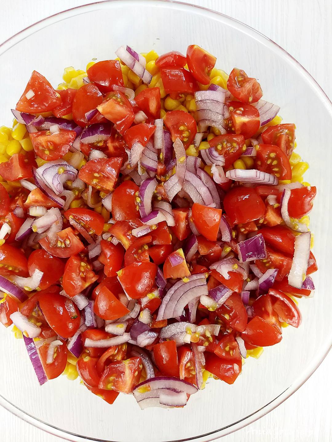 Dodaj pomidory z cebulą